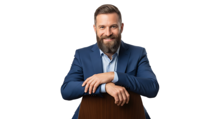 A Confident Bearded Business Professional in a Blue Suit Smiling and Leaning on the Back of a Chair with an Isolated Black Background and PNG Format Ideal for Professional Usage