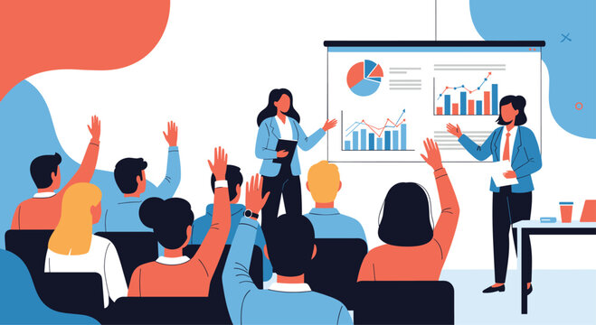 Business training session with presenters showing charts on a screen to an engaged audience, who are raising their hands to ask questions.