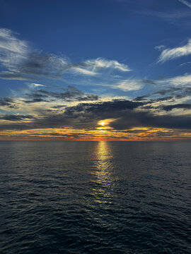 Dusk sky over calm ocean at evening.