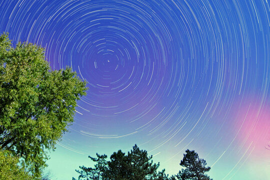 Geomagnetic storm hits Earth November 5, 2025: Aurora with stars and colorful sky. Caused by a coronal mass ejection (CME) that erupted from the sun - Powered by Adobe