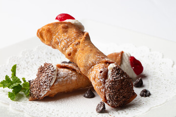 Cannoli dessert on a white plate 