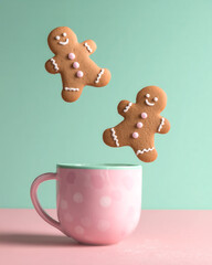 Gingerbread cookies with pink mug playful holiday scene