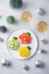 Healthy sandwiches with cream cheese and vegetables in the form of Christmas balls for Christmas holidays