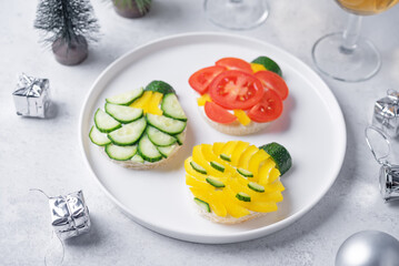 Healthy sandwiches with cream cheese and vegetables in the form of Christmas balls for Christmas holidays