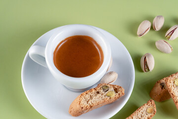 A classic espresso accompanied by delicious Italian cantucci, studded with green pistachios, a perfect indulgent treat