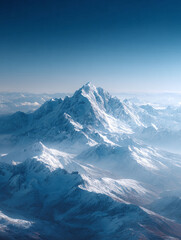 Obraz premium Majestic snowcapped mountain range under a clear, azure sky. A symbol of strength, endurance, and serene beauty. Ideal for travel, adventure, or nature themes.