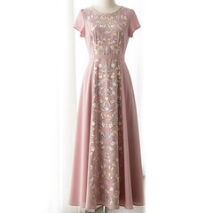 Obraz premium Elegant dusty rose floor length formal gown with short sleeves adorned with intricate floral embellishments and sparkling sequins for special occasions