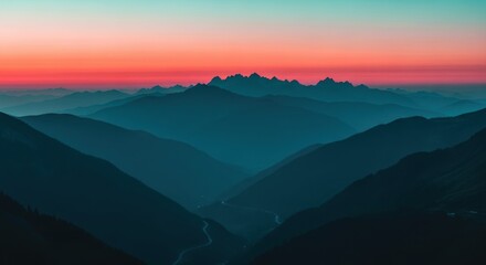 Scenic mountain landscape with layered ridges. Vibrant sunset sky with a colorful gradient. Winding road in a deep valley. Concept of journey and exploration. Adventure travel and outdoor lifestyle