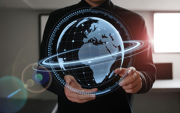 Young professional holds luminous Earth hologram with digital lines and orbital patterns today