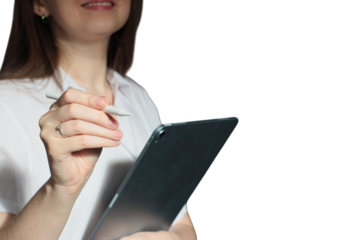 Woman holding a digital tablet with stylus during creative work session, isolated on white background. Concept of design process, technology, and artistic workflow in modern studio setting.