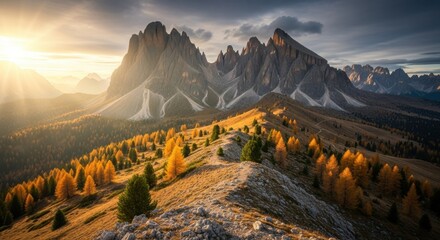 Majestic alpine landscape during a golden autumn sunrise. Scenic mountain ridge with yellow larch trees. Adventure travel and hiking destination concept. Epic wilderness exploration journey