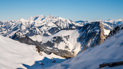 Naklejka premium Winter Landscape of Snowy Mountain and Forest in Switzerland. Rochers-de-Naye, Vaud, Switzerland.