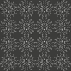 Seamless monochrome pattern in gray tones with a floral design
