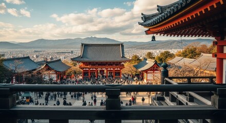 Obraz premium Scenic view of a historic Japanese temple in Kyoto. Traditional Asian architecture overlooking a modern cityscape. Famous cultural landmark for international travel and tourism concept