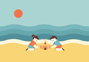 Fototapeta premium Children building sandcastle on sunny beach with waves in background