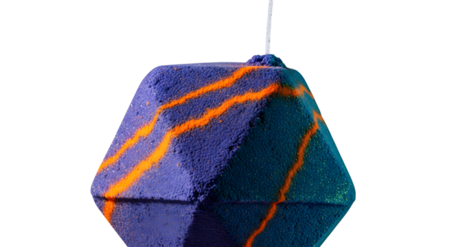 Hexagonal bath bomb with orange stripes isolated on transparent background - Powered by Adobe
