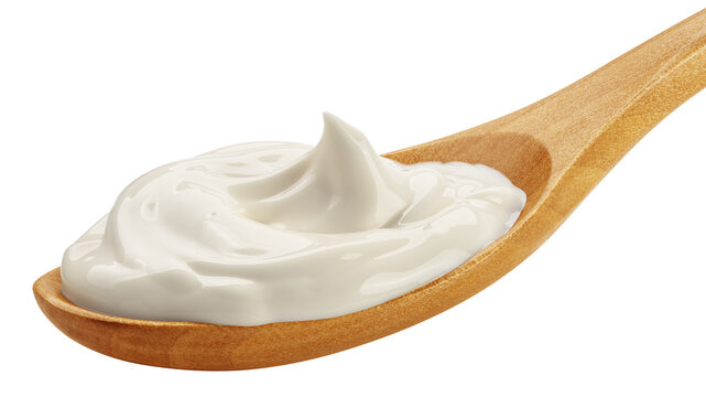 Sour Cream on wooden spoon, mayonnaise, yogurt, isolated, full depth of field