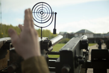 Sight of artillery weapon. Machine gun with a scope. Military training.