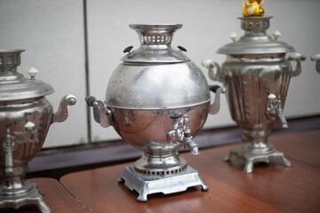 A Russian samovar of spherical shape. A samovar for boiling water. An ancient tradition of tea drinking.