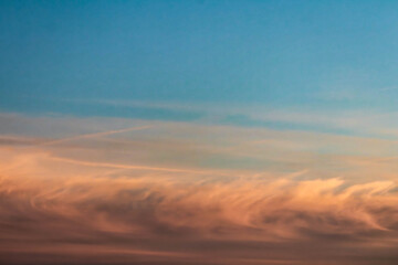 Pastel sky at sunset with soft clouds