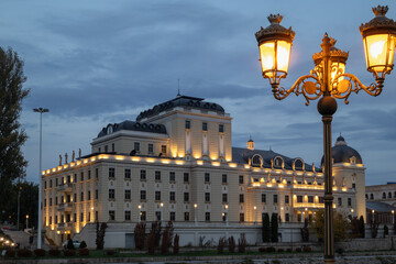 facade of the archaeological museum in skopje, north macedonia, illuminated at night. baroque revival architecture from the controversial skopje 2014 project