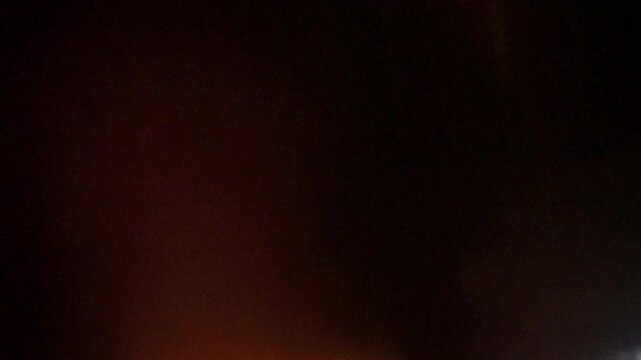  Abstract light leaks on black background with copy space. Studio lens flare bokeh effect. 4k video. Lens studio flare leak shimmer overlays 