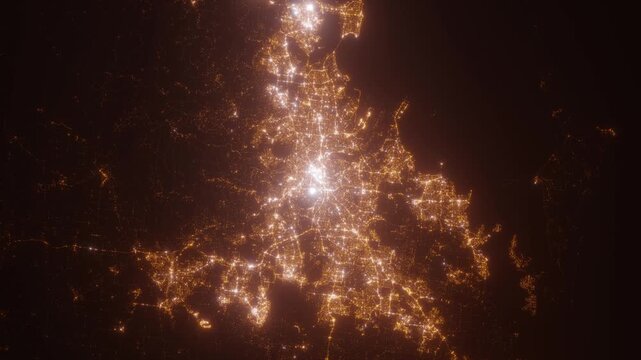 Brisbane (Australia) aerial view at night. Top view on modern city with glow effect. Camera is zooming out, rotating counterclockwise