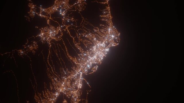 Honolulu (Hawaii, USA) aerial view at night. Top view on modern city with street lights. Camera is zooming out, rotating clockwise. Vertical video. The north is on the left side