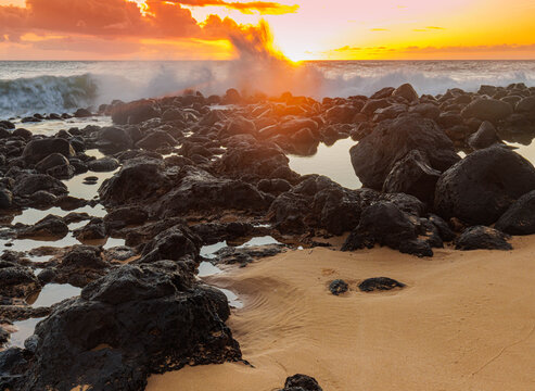 Sunlit Waves Washing Over Tide Pools on Papohaku Beach, Molikai, Hawaii, USA