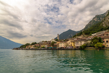 Picturesque view of Limone sul Garda, Italy, on the shore of Lake Garda with colorful houses and mountains in the background