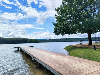 Wooden bridge walkway along the water's edge