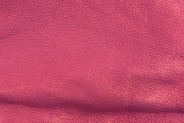 Pink natural leather background macro background. Pink background.