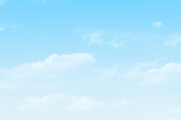 Fototapeta premium Blue pastel sky with white fluffy cloud. Cumulus clouds background. Cloudscape morning sky. The concepts of freedom of life, never give up and positive though energy.