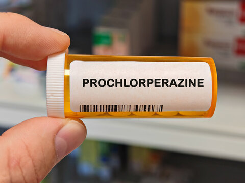 Box of PROCHLORPERAZINE tablets on a hospital pharmacy table used to treat nausea and psychotic disorders an antipsychotic.