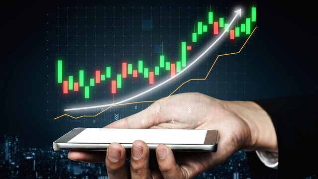 A hand holds a smartphone displaying stock market data with vibrant graphs and trading indicators, symbolizing business growth and financial strategy in a modern environment. Copula
