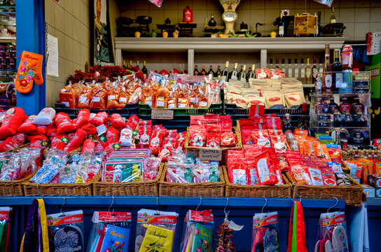 Budapest, Hungary - July 27, 2025: Traditional paprika and souvenir stand inside the Great Market Hall, featuring spices, wine, and Hungarian gifts for tourists
