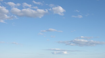 gradient sunny blue sky with clouds background