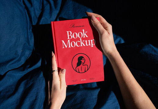 Woman Holding Book PSD Mockup