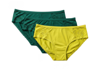 Three comfortable women s briefs in green and yellow isolated on transparent background