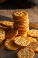 Round Crackers Snack.
A close-up photo of round crackers. Perfect for food, snack, bakery, or cooking-related projects.
