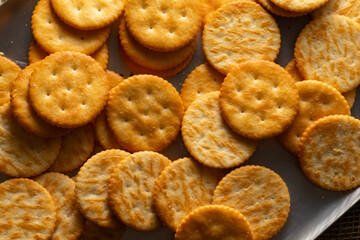 Round Crackers Snack.
A close-up photo of round crackers. Perfect for food, snack, bakery, or cooking-related projects.
