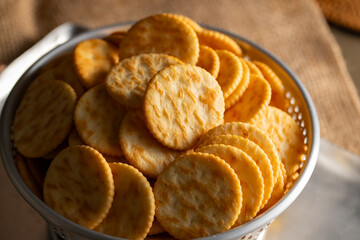 Round Crackers Snack.
A close-up photo of round crackers. Perfect for food, snack, bakery, or cooking-related projects.