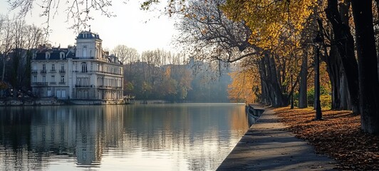 Autumnal Canal Scene with a Historic Mansion