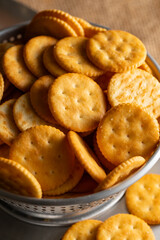 Round Crackers Snack.
A close-up photo of round crackers. Perfect for food, snack, bakery, or cooking-related projects.