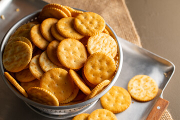 Round Crackers Snack.
A close-up photo of round crackers. Perfect for food, snack, bakery, or cooking-related projects.