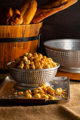 Caramel Popcorn Close-up.
Close-up photo of caramel-coated popcorn.