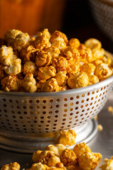 Caramel Popcorn Close-up.
Close-up photo of caramel-coated popcorn.