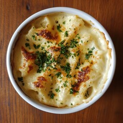 Creamy, cheesy dish in small white bowl