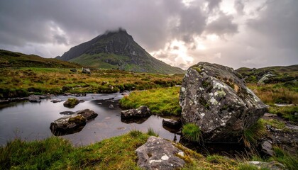 Picturesque Scottish Highlands Landscape with Mountain Stream and Dramatic Sky creating a scenic