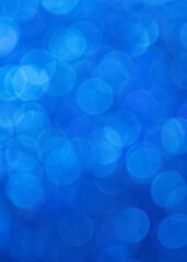 Christmas bokeh background with blue circles